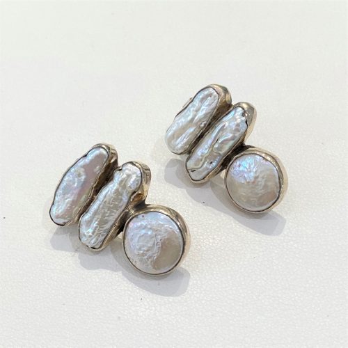 post earrings in sterling silver with two east to west bar pearls above a round coin pearl