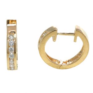 gold round huggie hoop earrings with channel set diamonds and hinged with snap in post closure