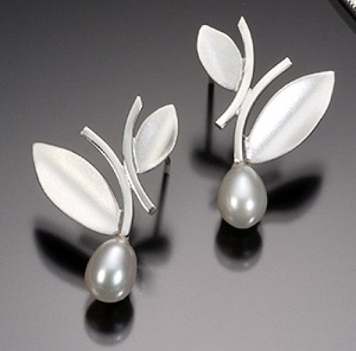 handcrafted sterling silver post earrings with alternating leaf design and white pearl bottom