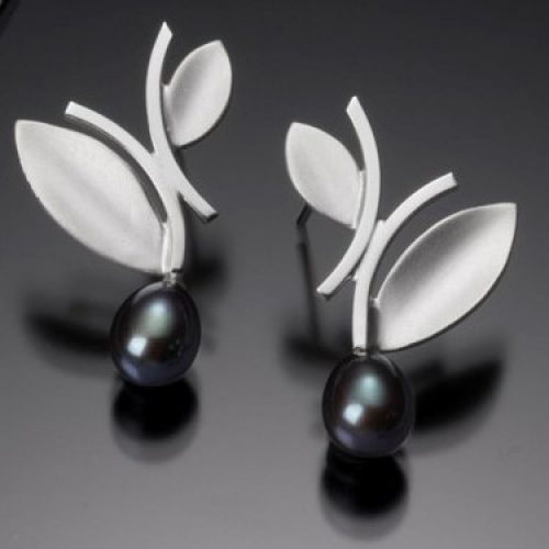 hancrafted sterling silver post earrings with alternating leaf and black pearl at the bottom