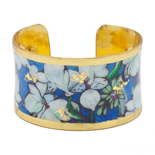 Wide solid Cuff Bracelet with painted print of white lillies on a blue background rimmed in gold leaf